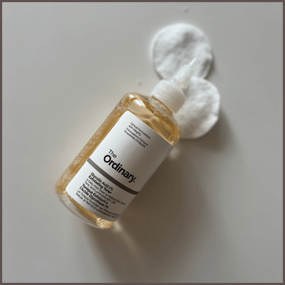 An exfoliating toner and peel pads