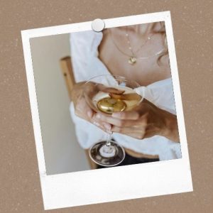 Woman holding a glass of wine